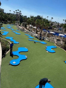 Marriott MiniLinks mini golf course with people playing