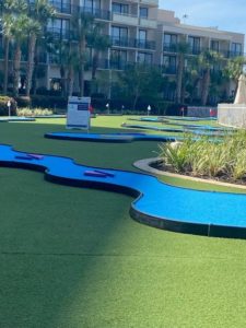 MiniLink hole with blue turf and Marriott Hotel in Orlando, Florida