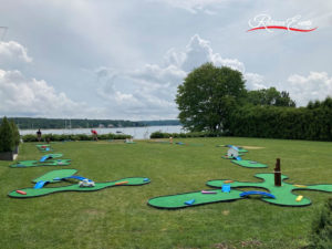 Water-front mini golf course system featuring several SplitShot® holes at the Oyster Bay Yacht Club in New York.