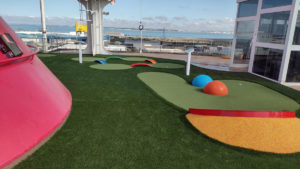 Installed on Carnival Radiance Cruise Ship in Venice, Italy, is AGS’s SplitShot® mini golf hole with multiple ramps and obstacles in place on the course.