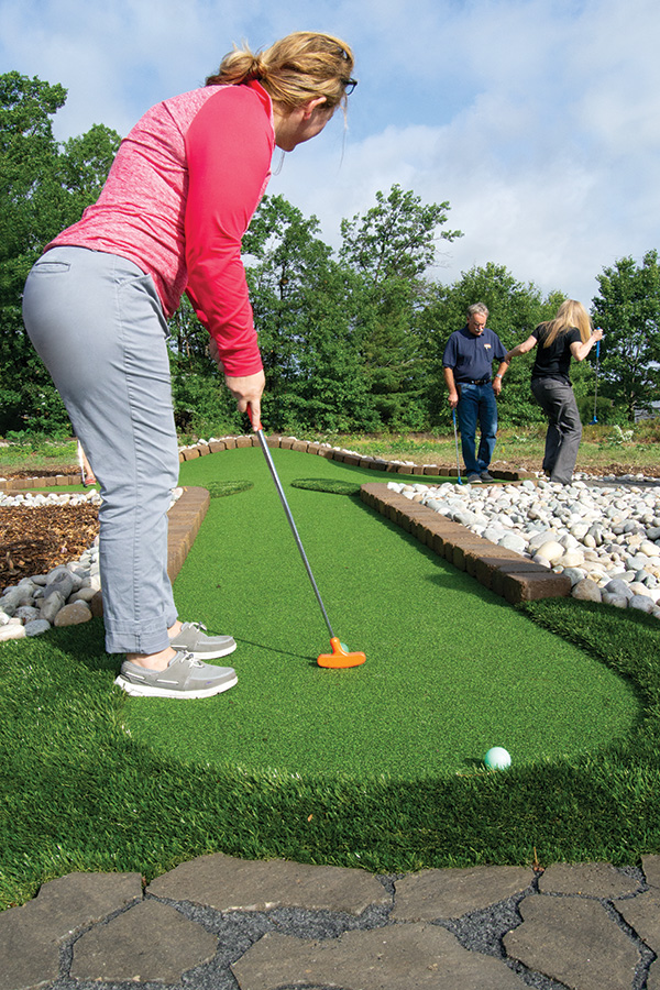 AGS Modular Advantage® Mini Golf looks and feels like a concrete course but can be moved if desired