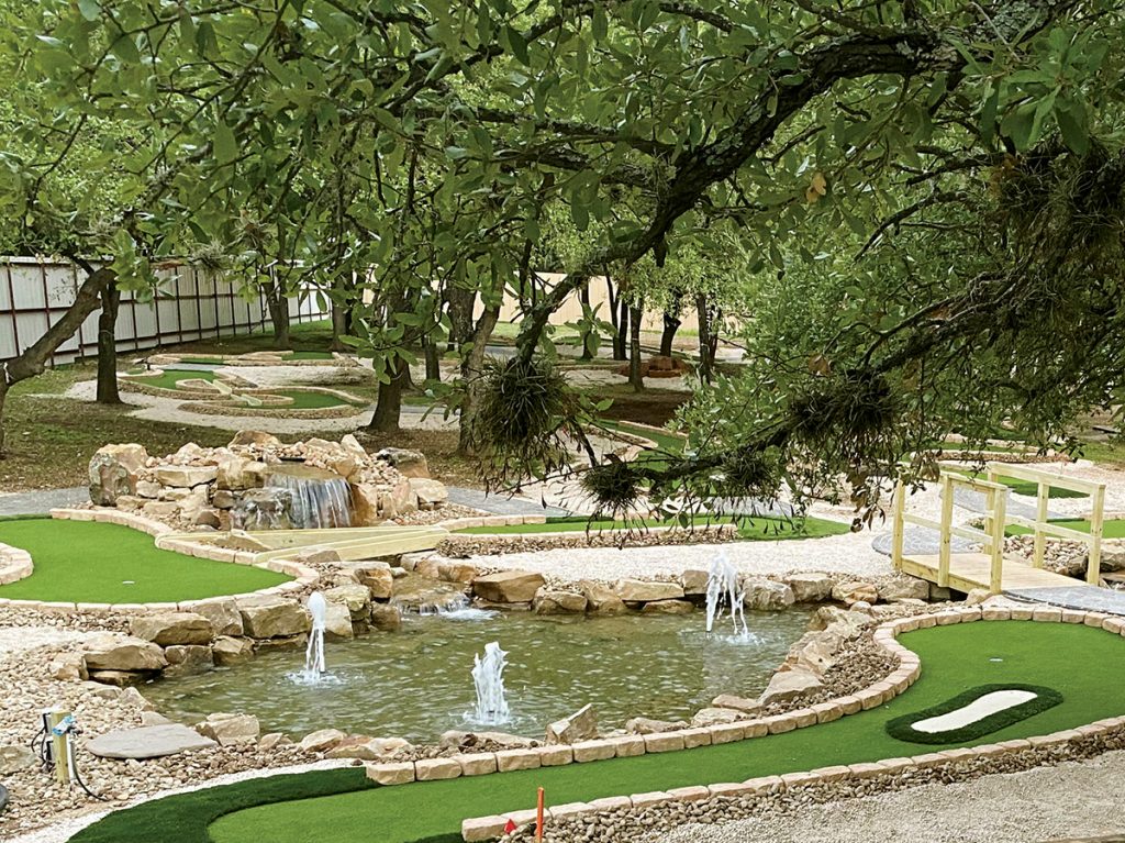 Tree-lined course with streams was possible with an eco-friendly Modular Advantage Mini Golf system