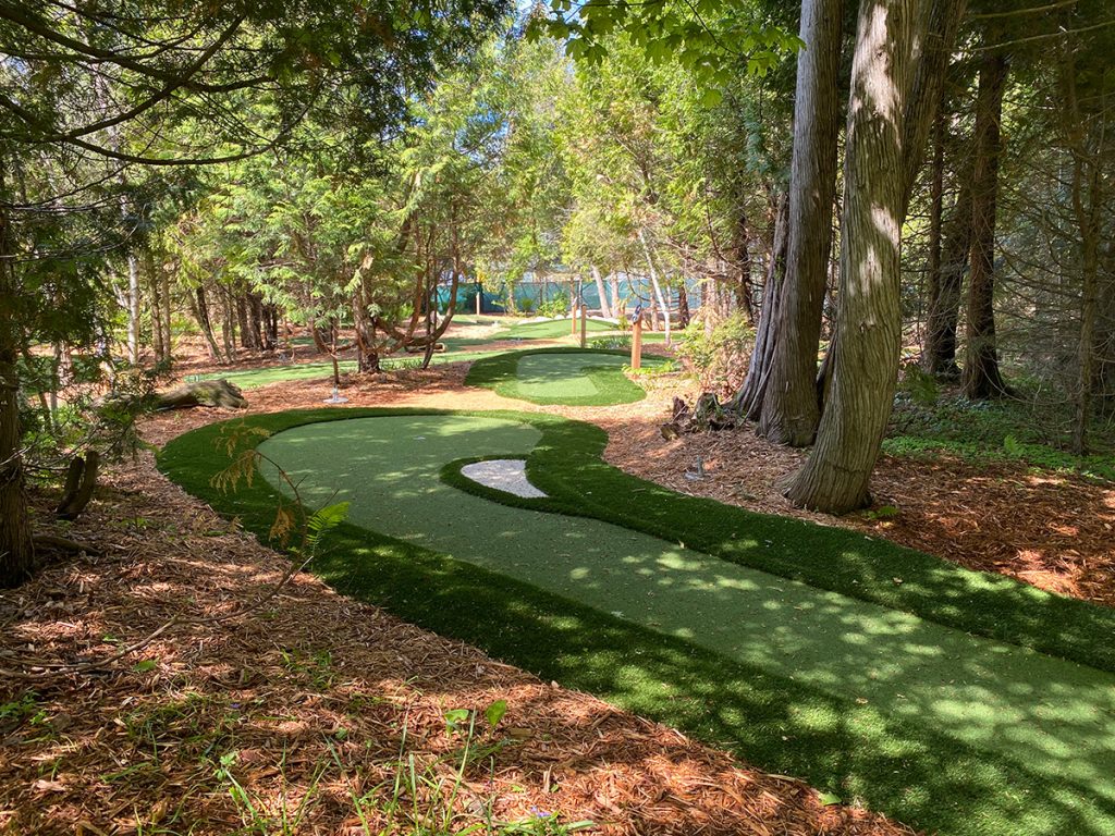 Grand Hotel’s AGS Modular Advantage® Mini Golf course winding through forest on Mackinac Island