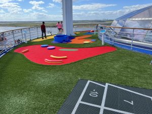 Portions of the refurbished AGS mini golf course and shuffleboard court on the Carnival Elation