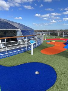Some of the “greens” in blue, orange and red on the refurbished Carnival Elation mini golf course