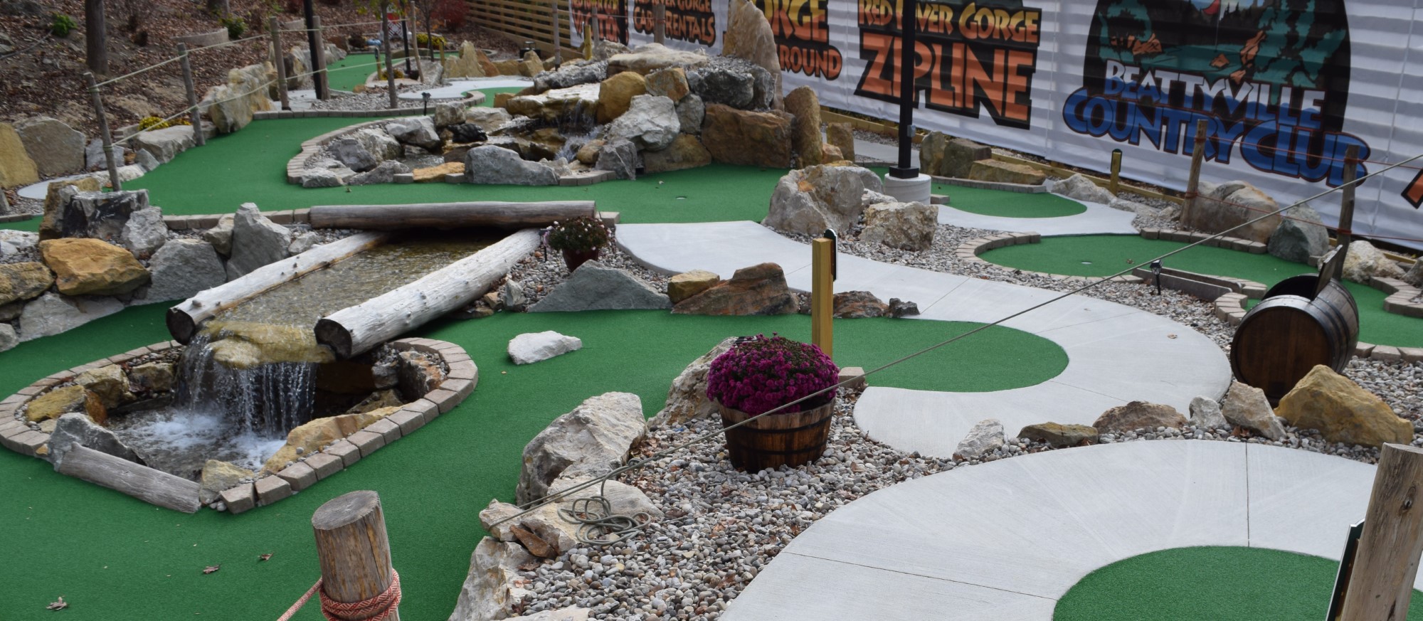 Massive stones, a pond, waterfalls and hole elevations make Thrillsville mini golf challenging
