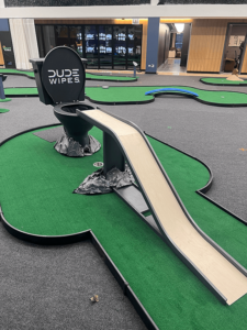 A ramp up to a toilet sculpture was on the Dude Wipes hole at the Barstool Chicago Mini Golf Open