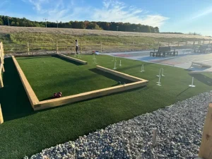 A bocce ball court and croquet court were installed side-by-side by AGS at the Alpen Bluffs Resort