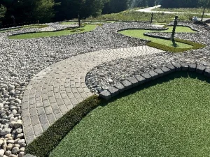 Carefully contoured mini golf holes and paving brick paths are ADA-compliant on this AGS course