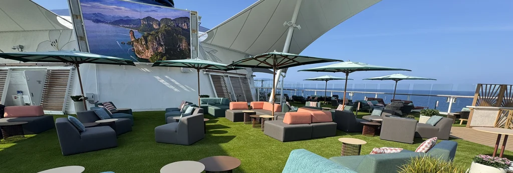 AGS designed this cruise ship lounging space to accommodate a large video screen for movie nights